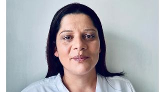 Nurse suspended for sharing 'sexy pics' with junior staff from her phone.
