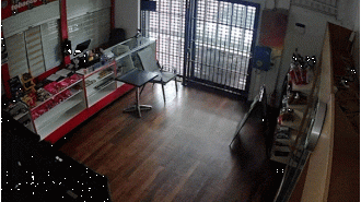 15-year-old driver crashes into Brisbane vape shop, captured on video.