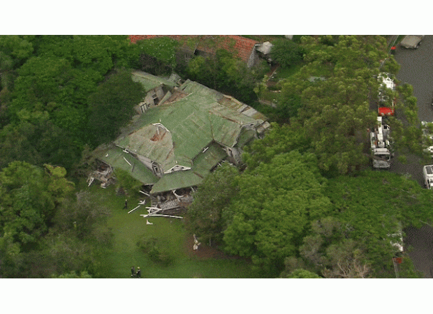 A tradie bravely saved an elderly person from a collapsed house in Brisbane, putting his own life at risk.