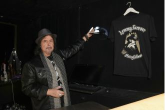 Lemmy's ashes put in London stripclub for good view.