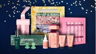 Elevate your holiday table with luxurious crackers filled with L'Occitane, Sisley Paris, and other beauty products.