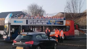 Eight people sent to hospital after a double-decker bus's roof is ripped off by a railway bridge.