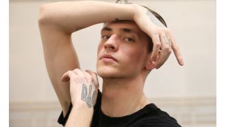 Russian ballet dancer with tattoos of Putin announces plans to leave country for personal reasons.