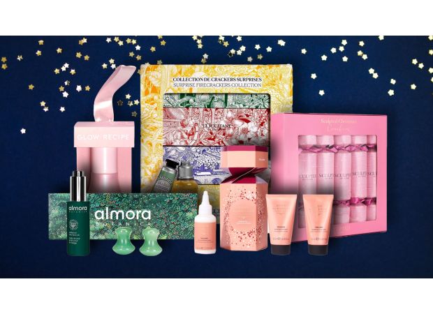 Elevate your holiday table with luxurious crackers filled with L'Occitane, Sisley Paris, and other beauty products.