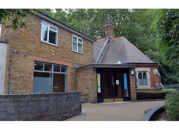 An elderly person died when a man crashed through a café skylight and landed on them.