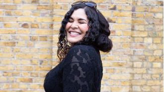 A man was taken into custody after a woman in her 40s was discovered fatally stabbed in a home.