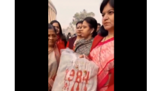 BJP lawmaker Aparajita Sarangi gives Priyanka Gandhi a '1984' bag as a gift.