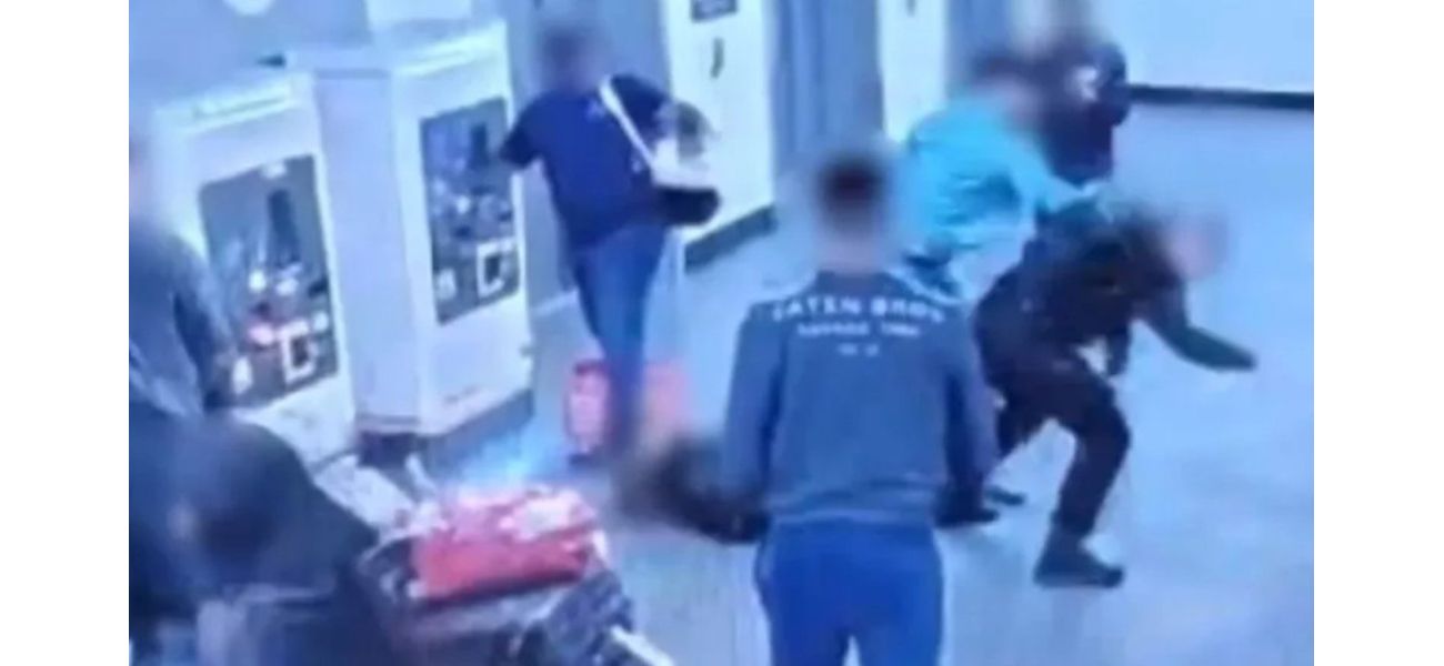 Two individuals accused of attacking officers at Manchester Airport.