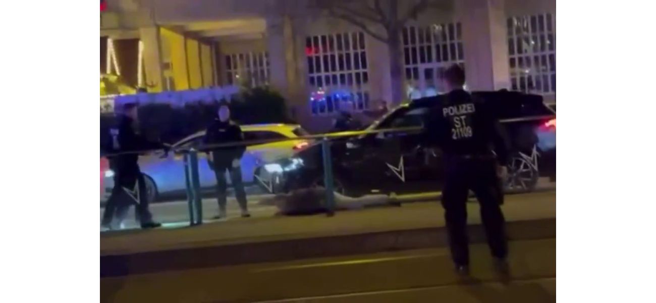 Suspect apprehended after car drives into crowded holiday market.