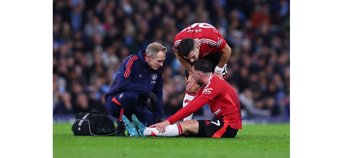Reece James consoles Mason Mount of Manchester United after he suffers a heartbreaking injury.