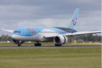 TUI flight attendant fell from plane while opening door prior to takeoff.