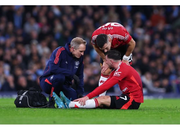Reece James consoles Mason Mount of Manchester United after he suffers a heartbreaking injury.
