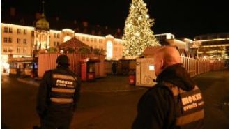 2 dead, 60 injured in car attack at German Christmas market; suspect in custody.