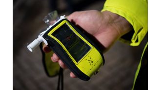 A scientist involved in breathalyser design was banned from driving after failing one himself.