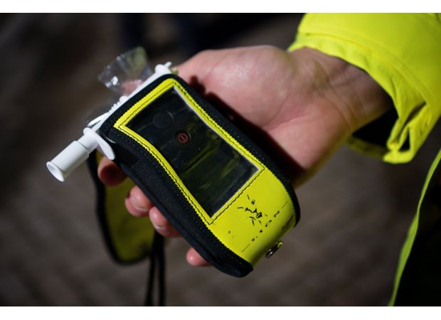 A scientist involved in breathalyser design was banned from driving after failing one himself.