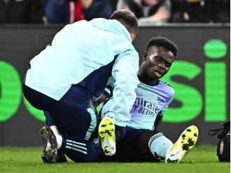 Arsenal's Bukayo Saka injured during match against Crystal Palace.