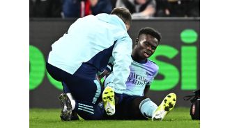 Arsenal's Bukayo Saka injured during match against Crystal Palace.