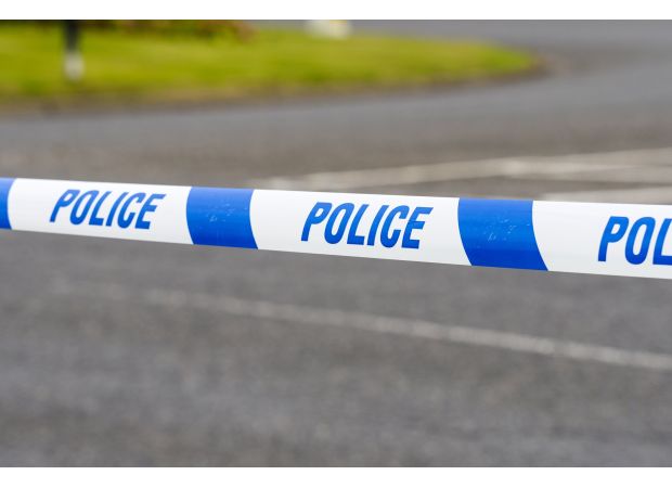 An infant died in a caravan, where a man was arrested for neglect.