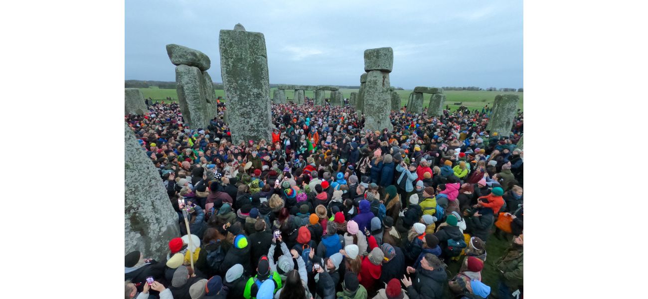 Many people gather to celebrate the winter solstice at Stonehenge.