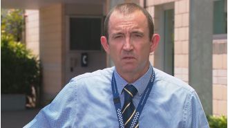 Police searching for killer of 23-year-old woman shot in street near Brisbane.