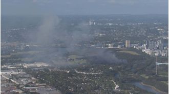 Firefighters confront blaze near Sydney Olympic Park