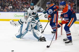 NHL rookie goalie for Sharks impresses despite defeat, proves he belongs in league.