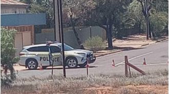 Attempted murder charged after police officer slashed with sword