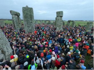 Many people gather to celebrate the winter solstice at Stonehenge.