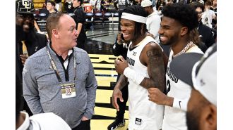 CU Buffs football team and Travis Hunter were honored and recognized at a basketball game.