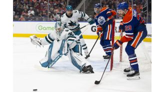NHL rookie goalie for Sharks impresses despite defeat, proves he belongs in league.