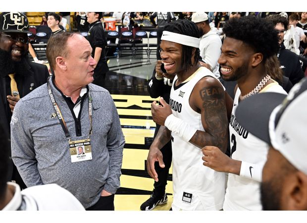CU Buffs football team and Travis Hunter were honored and recognized at a basketball game.