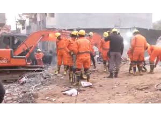 Building collapse in Punjab causes fatalities and potential entrapment, rescue efforts in progress.