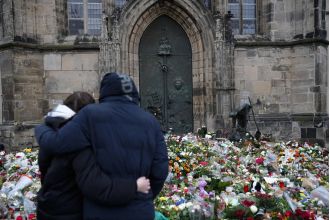 Man arrested in connection with German market attack confesses to warning, according to court testimony.