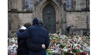 Man arrested in connection with German market attack confesses to warning, according to court testimony.