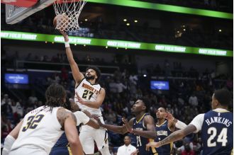 Nuggets' Murray leads team to OT victory with 17-point comeback against Pelicans, displaying clutch performance once again.