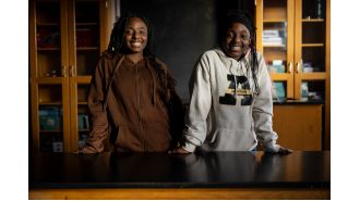 A middle school student from North Lawndale assists in the discovery of a molecule in goose droppings that can fight cancer.