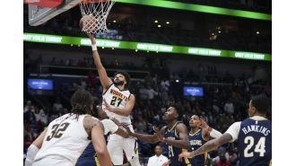 Nuggets' Murray leads team to OT victory with 17-point comeback against Pelicans, displaying clutch performance once again.