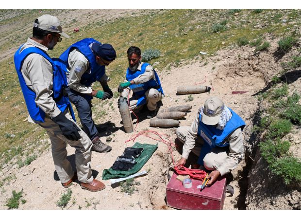 Former members of the Taliban are assisting humanitarian organizations in finding and removing landmines they had previously placed in Afghanistan.