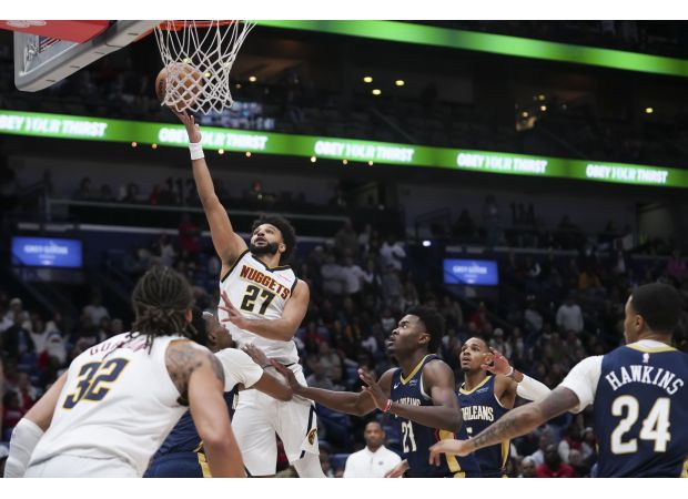 Nuggets' Murray leads team to OT victory with 17-point comeback against Pelicans, displaying clutch performance once again.