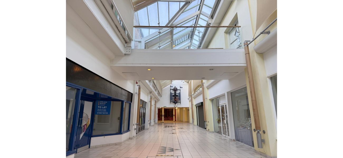 UK's most deserted shopping centre at Christmas, only three stores are open.