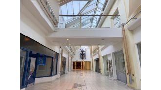 UK's most deserted shopping centre at Christmas, only three stores are open.