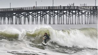 Man fatally trapped under debris on California beach after being hit by huge wave.