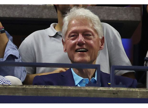 Bill Clinton hospitalized with fever, according to representative.