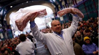 Britain's oldest meat market, which has been operating for 800 years, holds a Christmas Eve auction before possibly closing down.