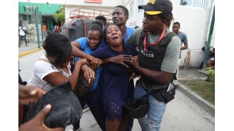 Gang assault in Haiti kills 2 journalists and injures others during coverage of hospital reopening.