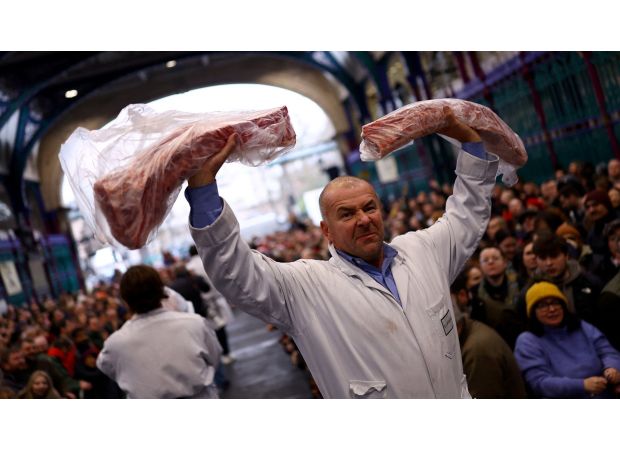 Britain's oldest meat market, which has been operating for 800 years, holds a Christmas Eve auction before possibly closing down.