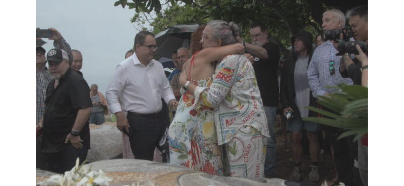 People who survived Cyclone Tracy gather to remember those who died, as a 50-year memorial is unveiled.