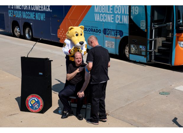 Polis is doing well with health care reform, but his backing of RFK Jr.'s anti-vaccine movement is a mistake.