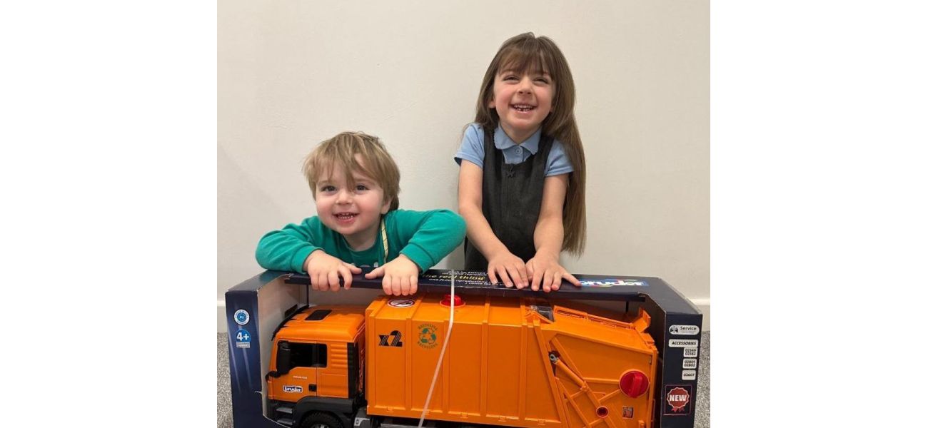 A toddler's day was made by binmen who gave him a special gift.