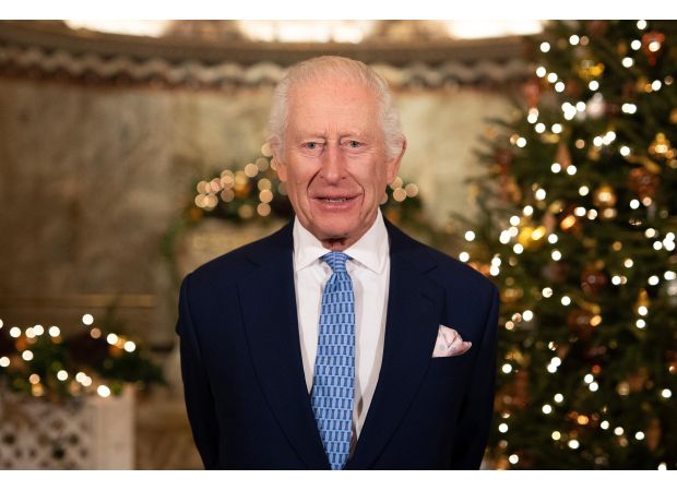 King Charles III highlights healthcare workers in Christmas address amid royal illnesses.